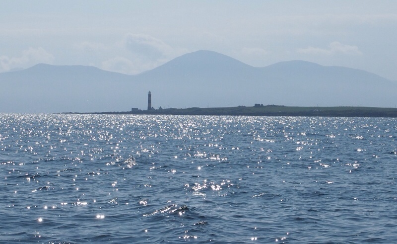 St John's Lighthouse with the distant mountains of Mourne